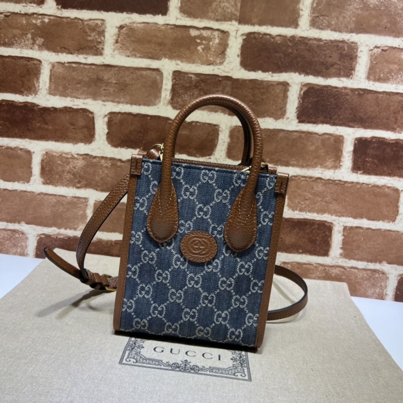 G*u*i top handle bags